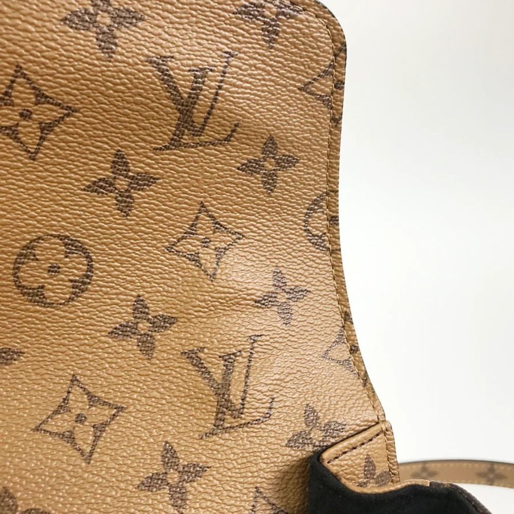Pochette Métis Reverse Monogram canvas - Picture 12 of 14